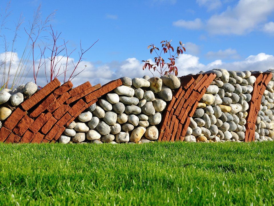 Cobble and sandstone sculptural wall, Appleby
